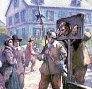 A crowd scene with pillory