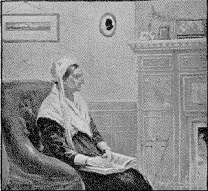 My grandmamma musing in a chair with an open book