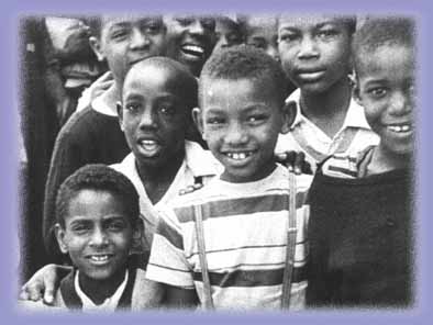 Hayti children outside the Regal Theater