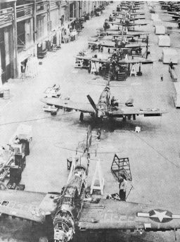 Image: PRODUCTION LINE METHODS IN REPAIR OF P-39'S McCLELLAN FIELD, CALIF.