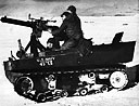 Seabees Manning an Anti-aircraft Machine Gun Mounted on Tractor
