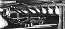 A starboard battery at night, with crewmen asleep in their hammocks