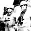 Captain John 
J. Herrick (left), the on-site task force commander, and Commander Herbert 
Ogler, commanding officer of the Maddox