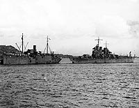 Photo # 80-G-258905:  USS St. Louis comes alongside USS Vestal for repairs, after the 13 July 1943 Battle of Kolombangara