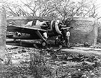 Photo # 80-G-271041: Brewster F2A-3 in a camouflaged revetment at Ewa, Hawaii, April 1942