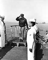 Photo # 80-G-420485: General of the Army Douglas MacArthur boards USS Missouri, off Inchon, Korea, Sept. 1950