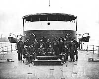 Photo # NH 59428:  USS Mahopac's officers on deck, 1865