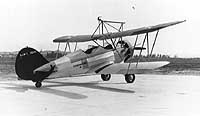 Photo # NH 80772:  Waco XJW-1 utility airplane parked at an airfield, circa 1934-1935