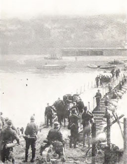German troops, using rubber boats for a pontoon bridge, cross the Moselle river into Luxembourg on May 10, 1940