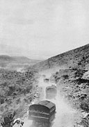 Raising the dust on the road from Marsabit, 1st S.A. Division transport heads north into the Chalbi Desert.