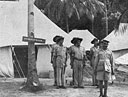 A party of Cape Corps personnel outside the Orderly Room at their tented leave camp at Mombasa.