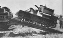 One of the tanks of the S.A. Light Armoured Detachment being run off its portee before the Kulkaber operations.