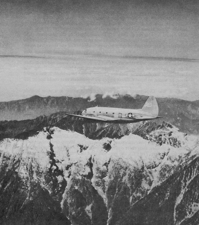 1944, a C-46 transport plane flying over the Hump.