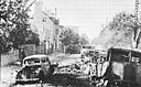 Destroyed Enemy Vehicles Cluttering a Street in Avranches