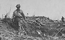 2d Division Troops move through a devastated area near Brest