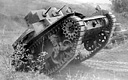 U.S. LIGHT TANK M2A2 during maneuvers on Oahu, 1942. This light tank with
twin turrets, one containing a .50-caliber machine gun and the other a
.30-caliber machine gun, was first manufactured in 1935. In December 1942, when
it was declared obsolete, there were 234 left in the Army. The M2A2 light tank
is a good example of the type of equipment available shortly after the entry of
the United States into World War II.