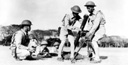 MORTAR SQUAD ASSEMBLING AN 81-MM. MORTAR M1 during training in the
Philippine Islands in 1941 (top). New recruits are given instruction in use of the
Browning .30-caliber machine gun M1917A1 (bottom). In 1936 a program for
national defense was initiated in the Philippine Islands. A military mission of U.S.
officers was charged with the organization and training of Filipino regular troops. In
July 1941 the Philippine Army was ordered into the service of the Army of the United
States and U.S. troops were sent to the islands from the United States.