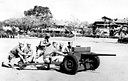 FILIPINO TROOPS training with a 37-mm. antitank gun M3. As a result of the
war warning to all overseas garrisons on 27 November 1941, the U.S. forces in
the Philippines went on a full war alert. Over a period of years the Japanese had
collected a valuable store of information about the Philippines and planned to
occupy the Philippine Islands, eliminating all U.S. troops there.