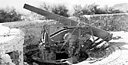 COASTAL DEFENSE GUN on Corregidor (top); 12-inch mortars on Corregidor
(bottom). Corregidor's armament comprised eight 12-inch guns, twelve 12-inch
mortars, two 10-inch guns, five 6-inch guns, twenty 155-mm. guns, and assorted 
guns of lesser caliber, including antiaircraft guns. The fixed gun emplacements 
were in open concrete pits and exposed to aerial attack and artillery
shelling. The Japanese kept up strong concentrations of fire against the defenses 
on Corregidor until most of the defending guns were knocked out.