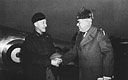 MAJ. GEN. W. W. FOSTER (left) with Col. J. P. Glandon at Dawson Creek, British Columbia, January 1944
