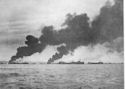 JAP PLANKS SHOT DOWN IN ATTACK ON OKINAWA INVASION FLEET<