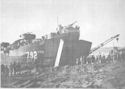 COAST GUARD-MANNED LST UNLOADS AT IWO JIMA