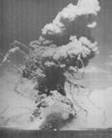 AN AMERICAN CARGO SHIP HIT BY NAZI DIVE BOMBERS DURING THE INVASION OF SICILY