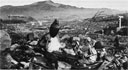 Battered Buddhist figures symbolize the atomic destruction suffered at Nagasaki