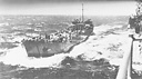 Transferring bombs from LST to the carrier Hancock at sea