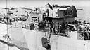 Load of powder midway between between the Shasta and the cruiser Vicksburg at sea