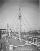 Neosho, as delivered to the U.S. Navy in August 1939. View looking forward from after deck house shows complex piping typically found on oilers. (National Archives)