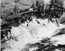 Further evidence of the difficulties experienced by oiler crews as they attempted to conduct fueling operations in heavy seas.