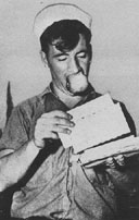 Sailor opening mail.