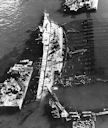 Image: USN NR&L (MOD) 39770 Utah at the completion of first pulling period showing blister cut away to provide fairlead to hitch pads. Ship is in about 68° position.
