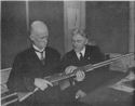 John M. Browning Examining One of His Automatic Machine Rifles in 1918