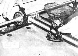 Figure 13. Orienting pencil carriage
