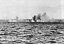 Enemy Mortar Shells Bursting at Shoreline, Blue Beaches, D-Day