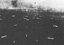 Landing Craft Waves Approaching Beach Under Cover of Naval Bombardment, D-Day (H-Hour-minus-15)