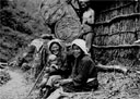 1. wood carriers resting on a steep mountain path