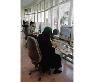 Iranians surf the internet at a cafe in Tehran