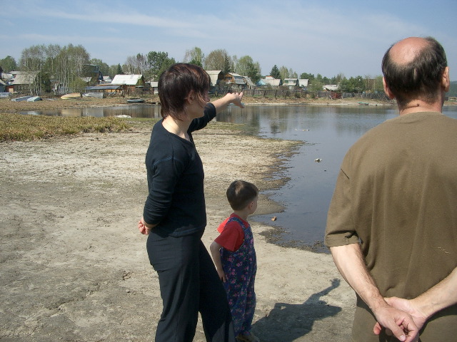 Bay of the Angara with Elena and son. Dacha's in background