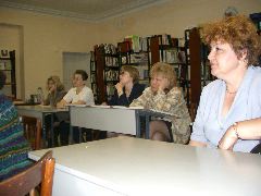 Attending to the words of teh Head Librarian