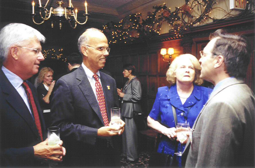 Tom Lutgen and Sherry Adams mingle at the awards banquet.