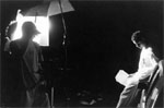 Jackson Brown and Aaron Freeman prepare for a rainy car scene