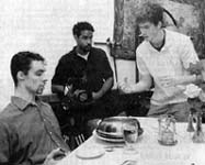 Freeman and Aaron Cantrell rehearse a scene while Jackson Brown waits to film it