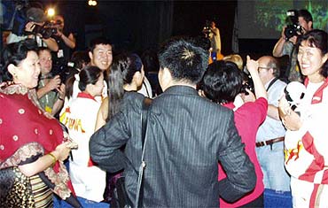Celebrations inside the IOC meeting site in Moscow. July 2001.