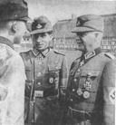 Figure 20.--Labor Service private (left), sergeant (center), and general officer (right)