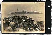 Album S-589, page 2: USS Philippines seen from a launch returning crew members from a sightseeing trip to Paris, August 1919