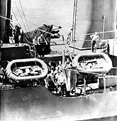 Photo # 80-G-7747:  Transfer of aviators from USS Monaghan to USS Enterprise, 31 May 1942, while the ships were en route to the Midway area.