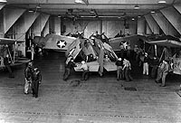 Photo # 80-G-14524:  Scene on USS Long Island's hangar deck, June 1942